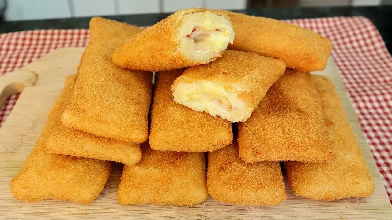 O cigarrete de presunto e queijo é aquele salgado clássico que faz sucesso em padarias...
